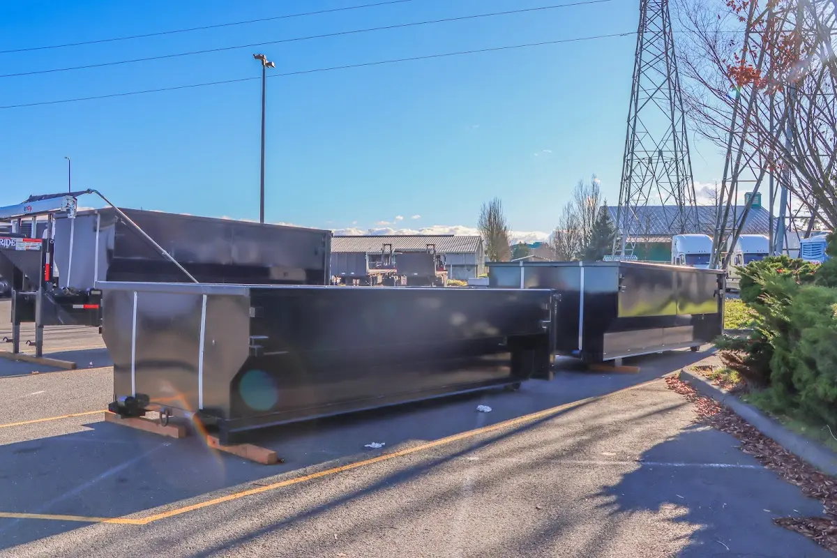 Roll-off dumpster ready for waste disposal at job site for 15 Yard Dumpster Rental in Manchester